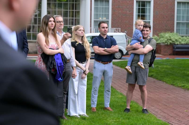 a group of people standing outside