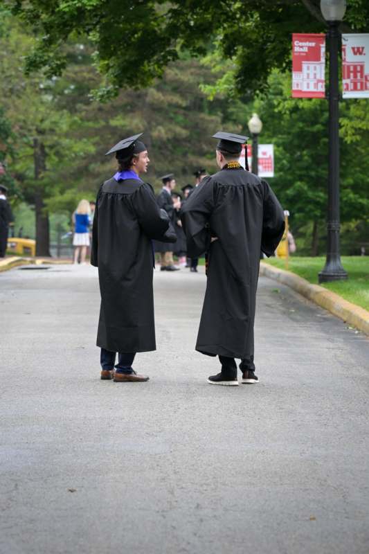 a group of people in graduation gowns