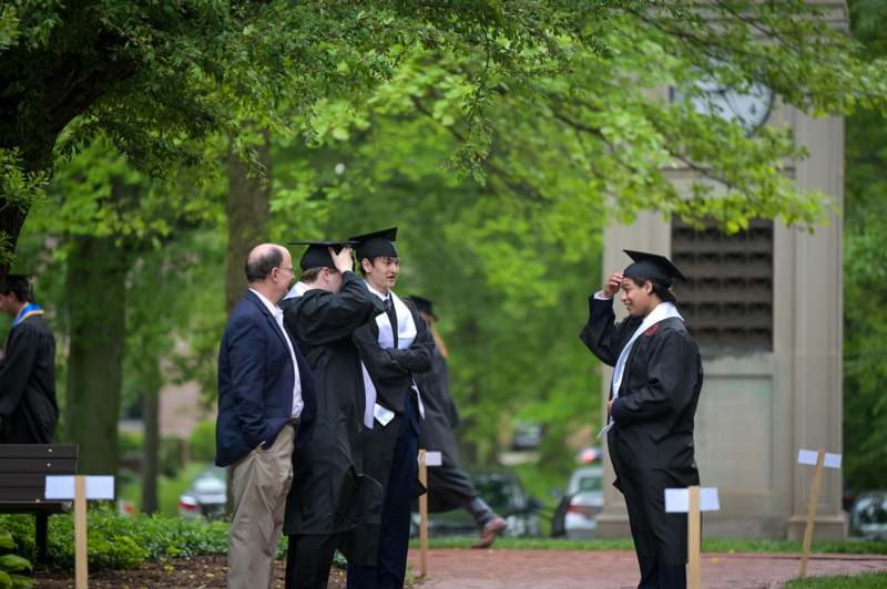 a group of people in graduation gowns