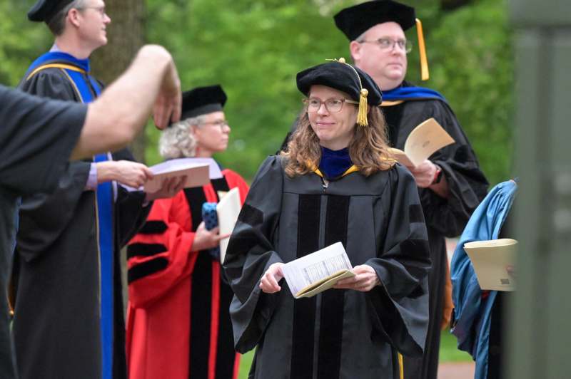 a group of people in graduation gowns