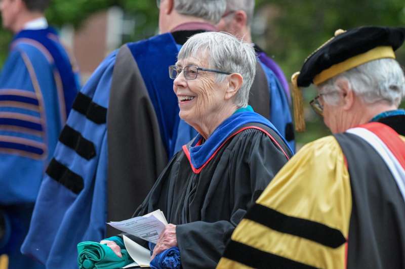 a woman in a graduation gown