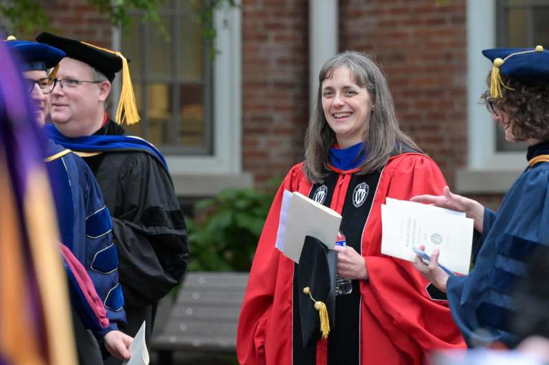 a group of people in graduation gowns