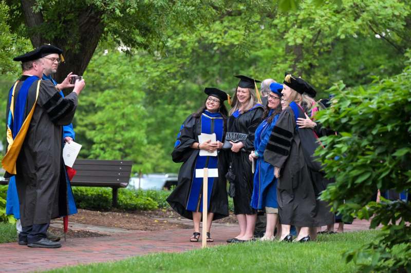 a group of people in graduation gowns