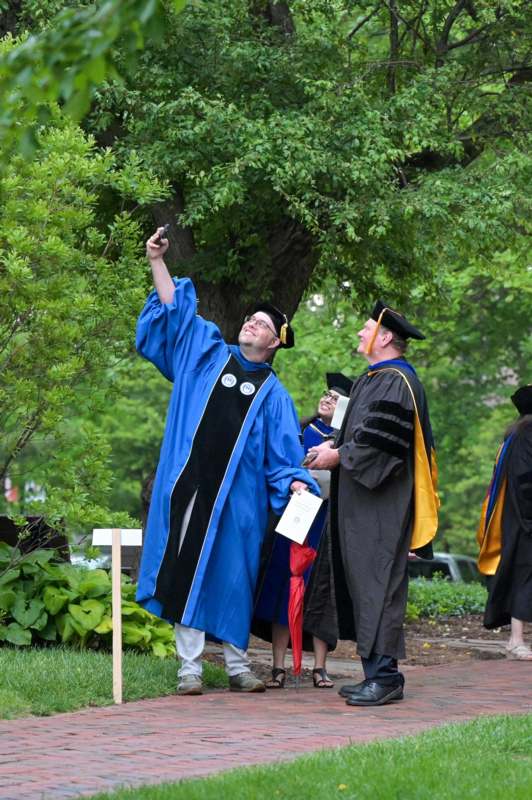 a group of people in graduation gowns