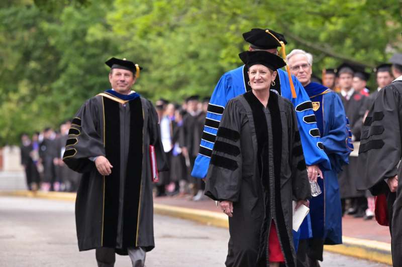 a group of people wearing graduation gowns