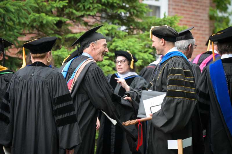 a group of people in graduation gowns
