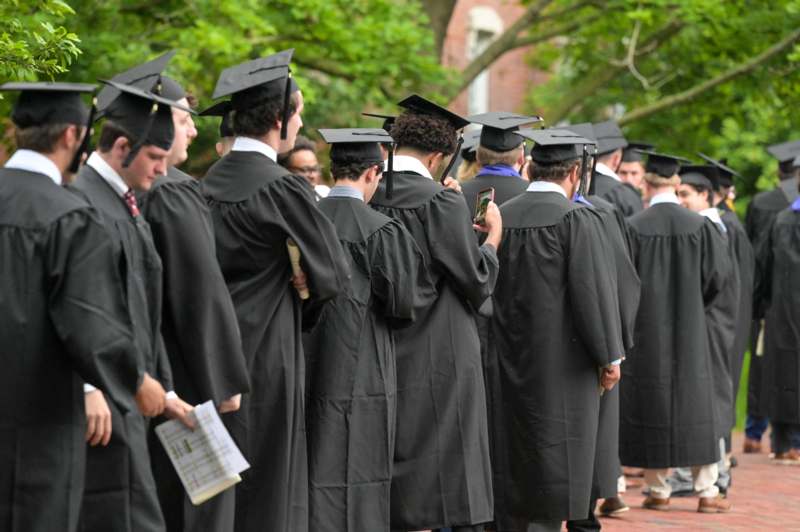 a group of people in graduation gowns