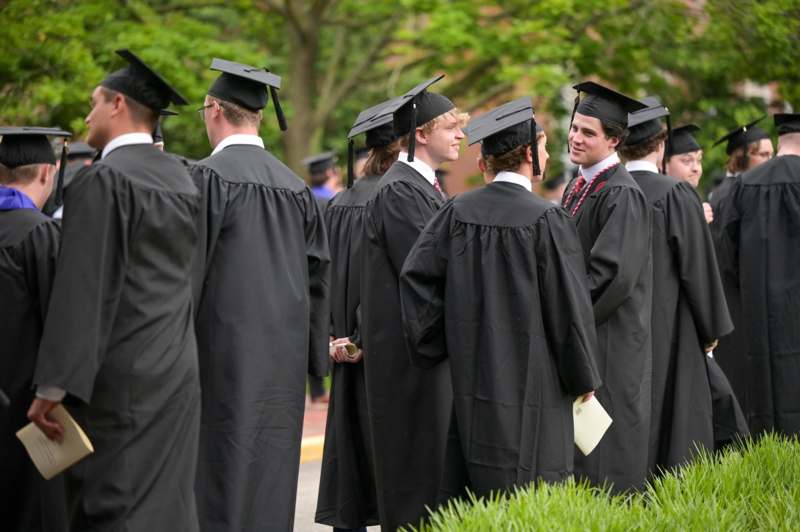 a group of people in graduation gowns