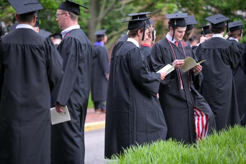 a group of people in graduation gowns