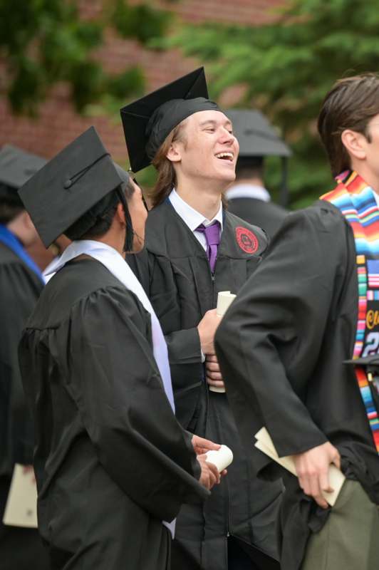 a group of people in graduation gowns