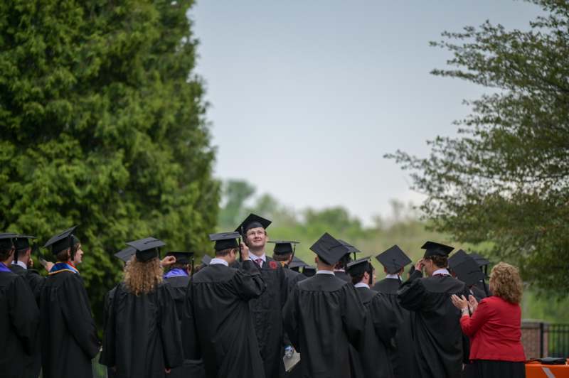 a group of people in graduation gowns