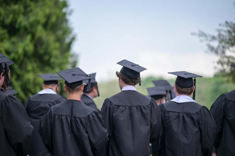 a group of people in graduation gowns