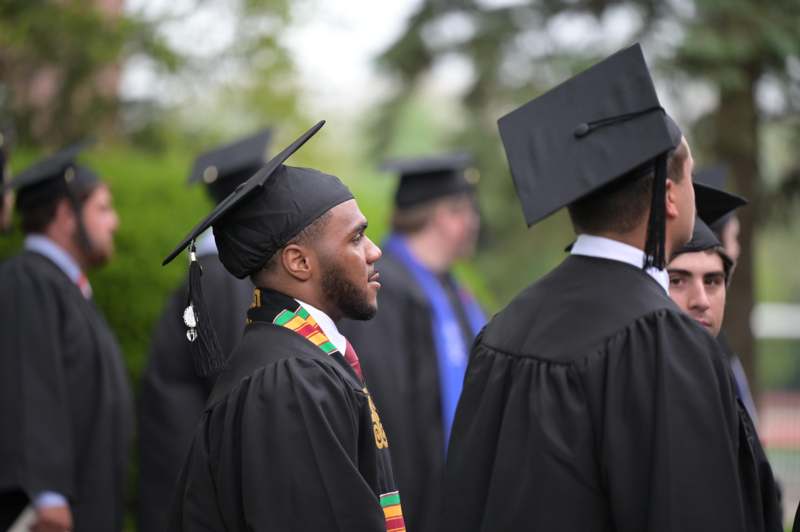 a group of people wearing graduation gowns