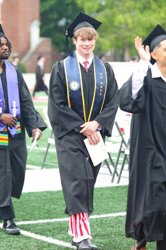 a man in a graduation gown