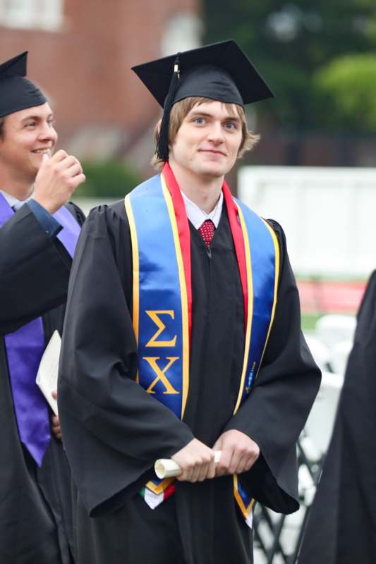 a man in a graduation gown