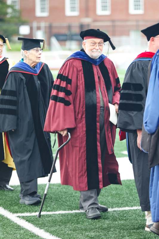 a man in a graduation gown