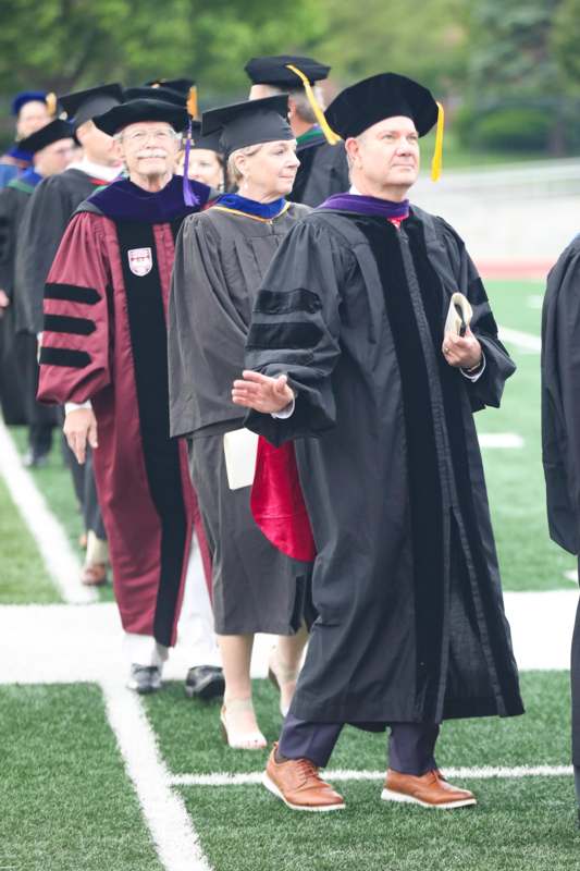 a group of people in graduation gowns