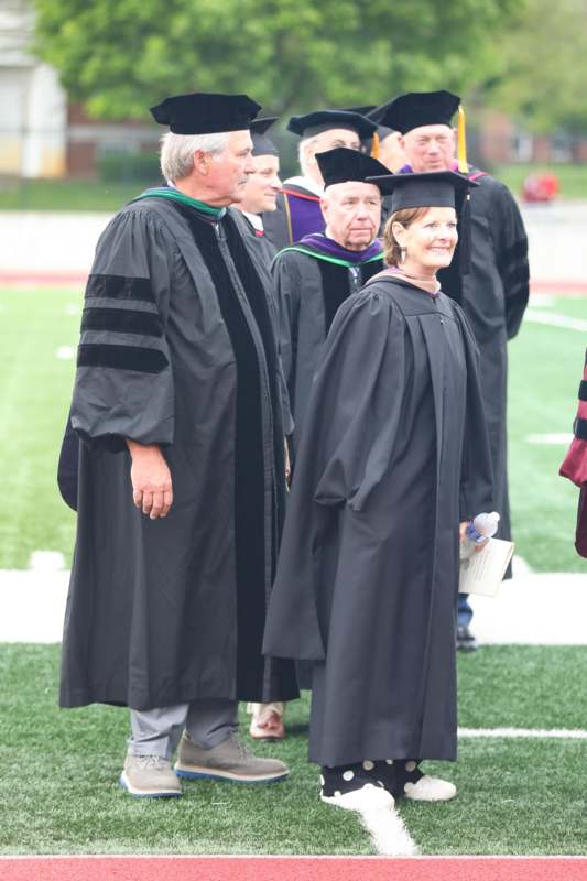 a group of people wearing graduation gowns