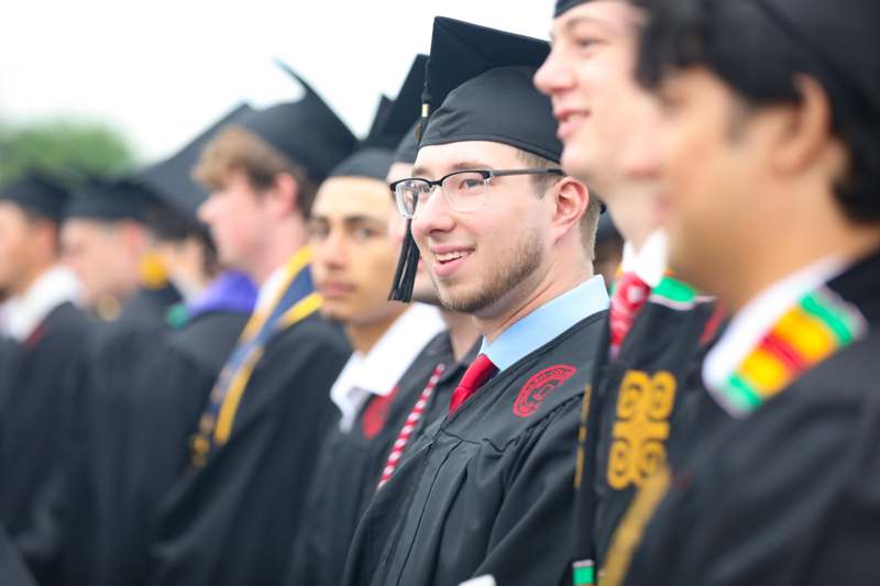 a group of people in graduation gowns