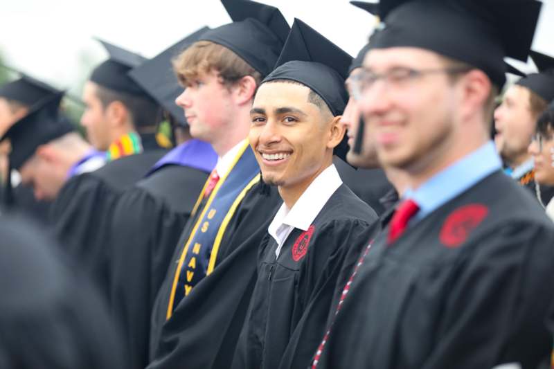 a group of people in graduation gowns