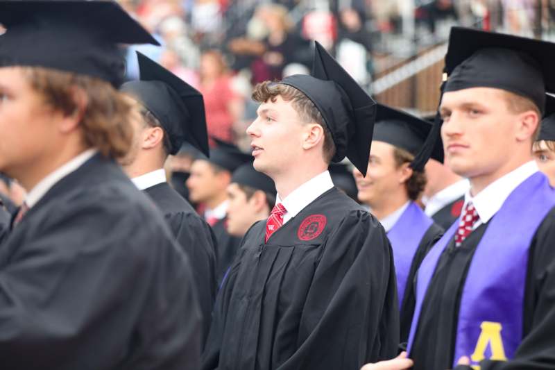 a group of people in graduation gowns
