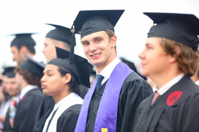 a group of people in graduation gowns