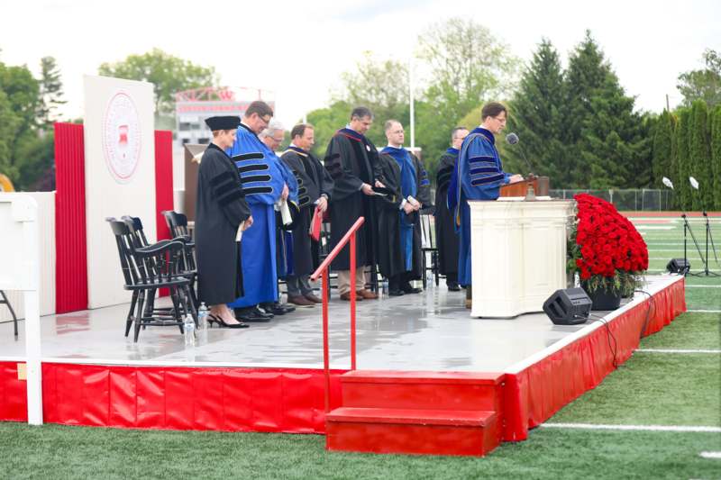 a group of people standing on a stage