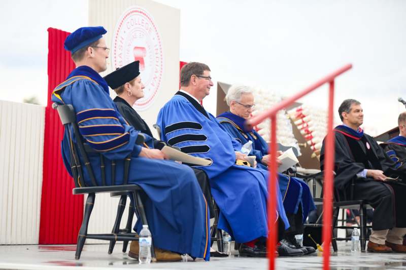 a group of people in graduation gowns