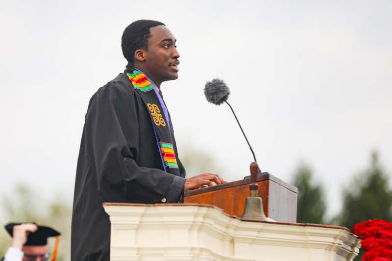 a man standing at a podium