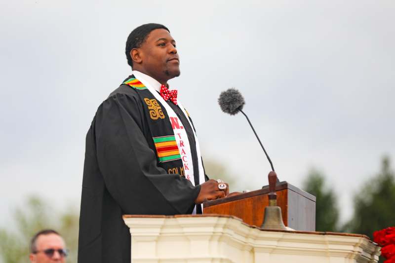 a man standing at a podium