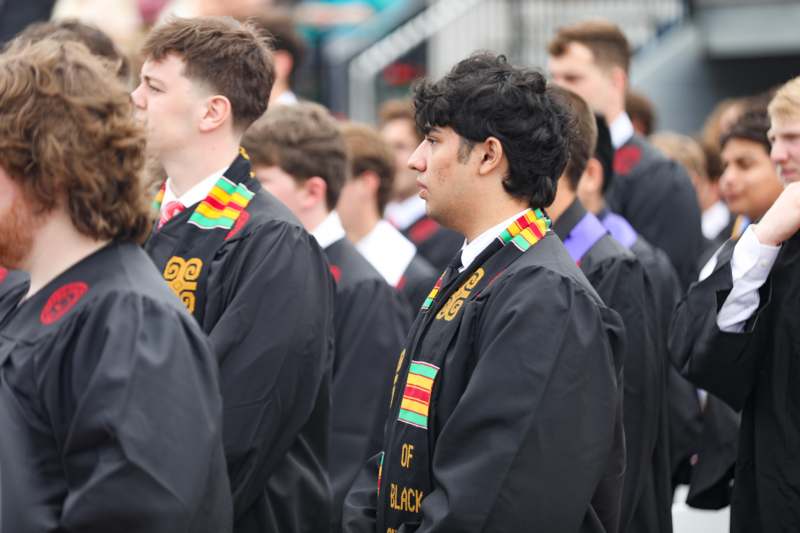 a group of people in graduation gowns