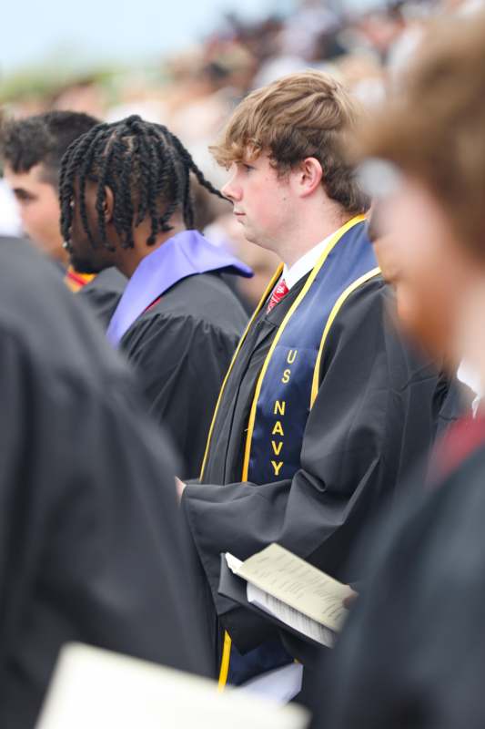 a group of people in graduation gowns
