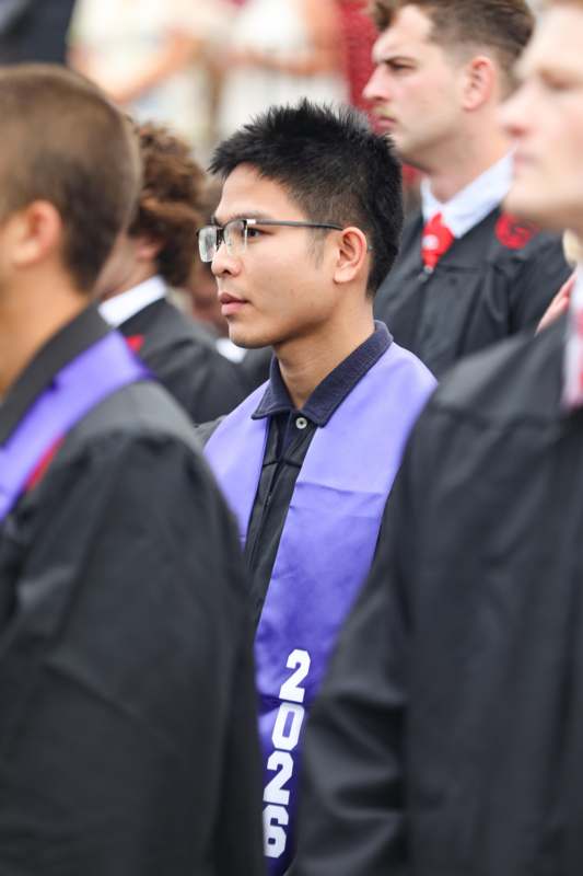 a group of people wearing graduation gowns