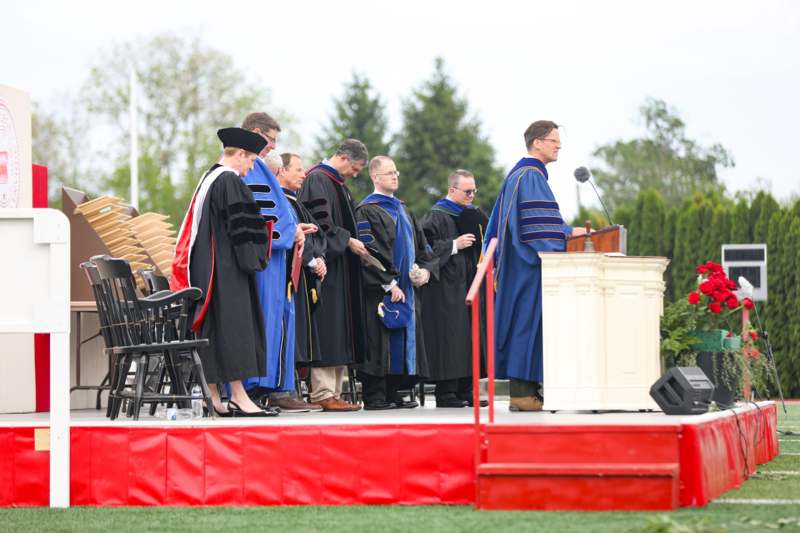 a group of people standing on a stage