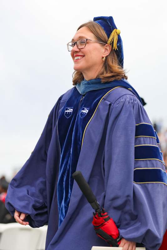 a woman in a graduation gown