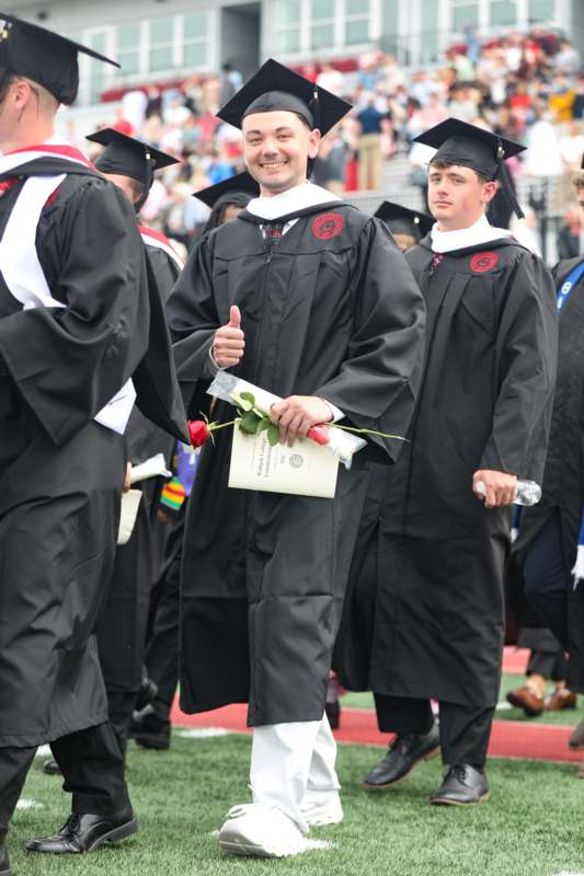 a group of people in graduation gowns