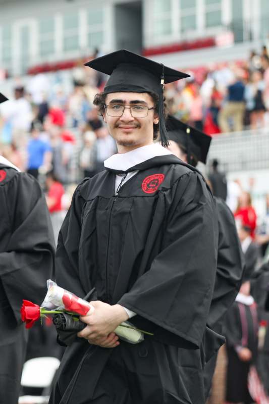 a man in a graduation gown
