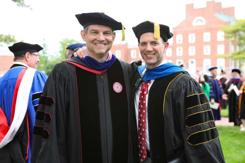 a man in a graduation gown