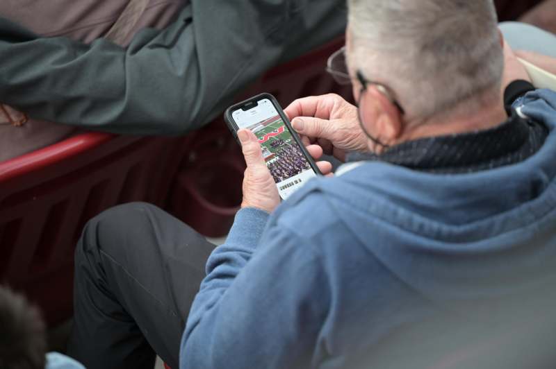 a man holding a cell phone