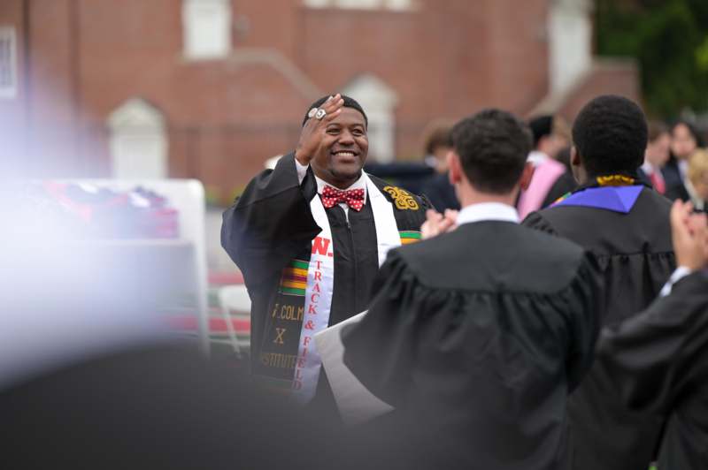 a man in a graduation gown