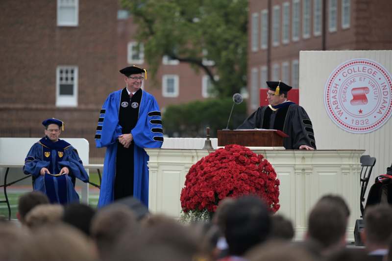 a group of people in graduation gowns
