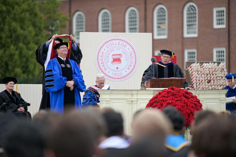a group of people in graduation gowns