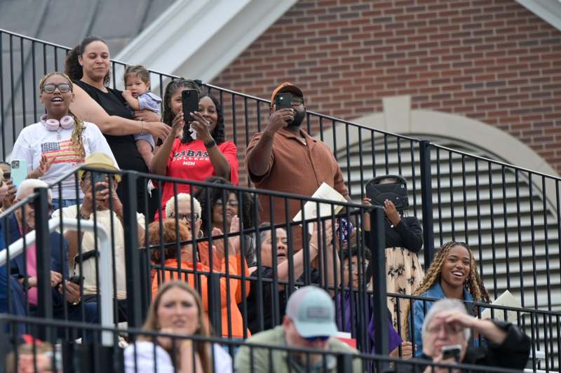 a group of people standing on stairs