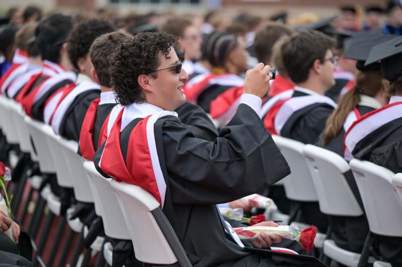 a group of people sitting in chairs