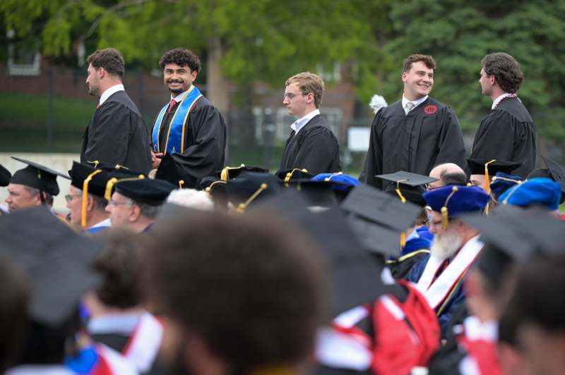 a group of people in graduation gowns