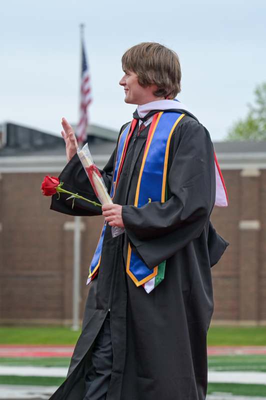 a man in a graduation gown