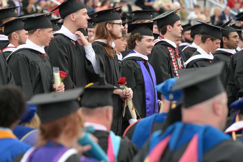 a group of people in graduation gowns