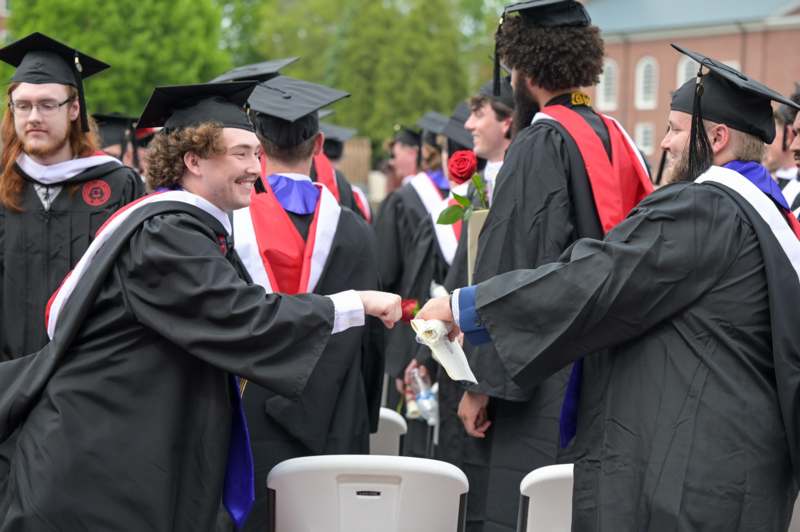 a group of people in graduation gowns