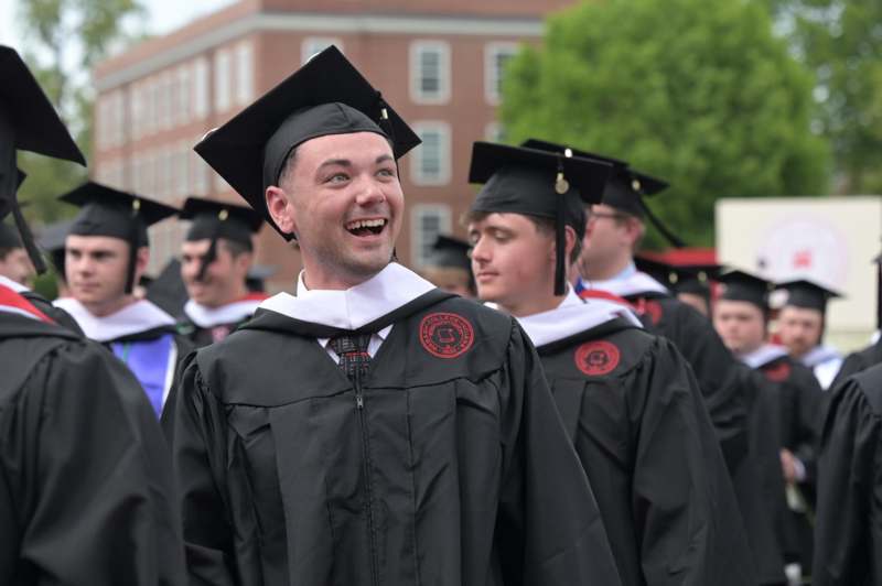 a group of people wearing graduation gowns