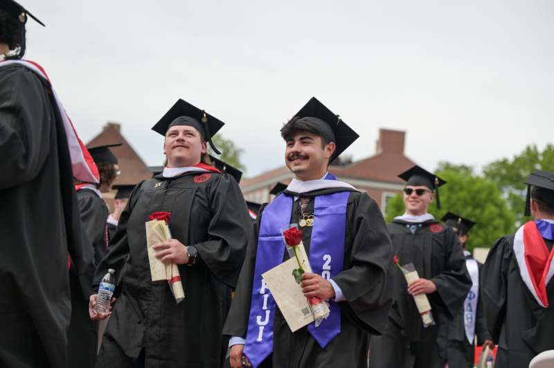 a group of people in graduation gowns
